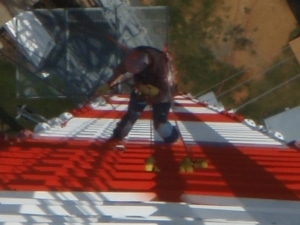 on the job at skyline tower painting